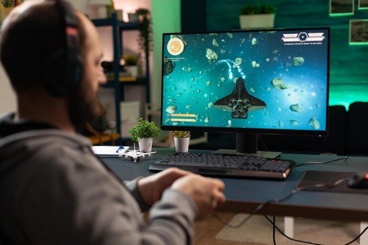 gamer-using-headphones-joystick-play-video-games-computer-man-playing-with-controller-audio-headset-online-gaming-player-having-fun-with-equipment-play-games_482257-39555.jpg
