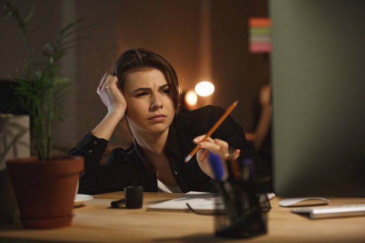 tired-woman-with-pencil-working-with-computer_171337-15555.jpg